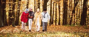 bigstock-Group-Of-Senior-Friends-Walkin-393415787-1