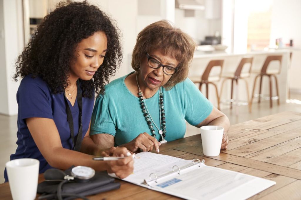 Woman and daughter talk about senior healthcare options