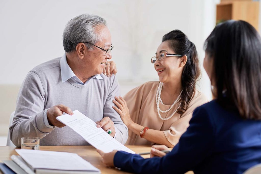 Man and woman learn about long-term vs. short-term care