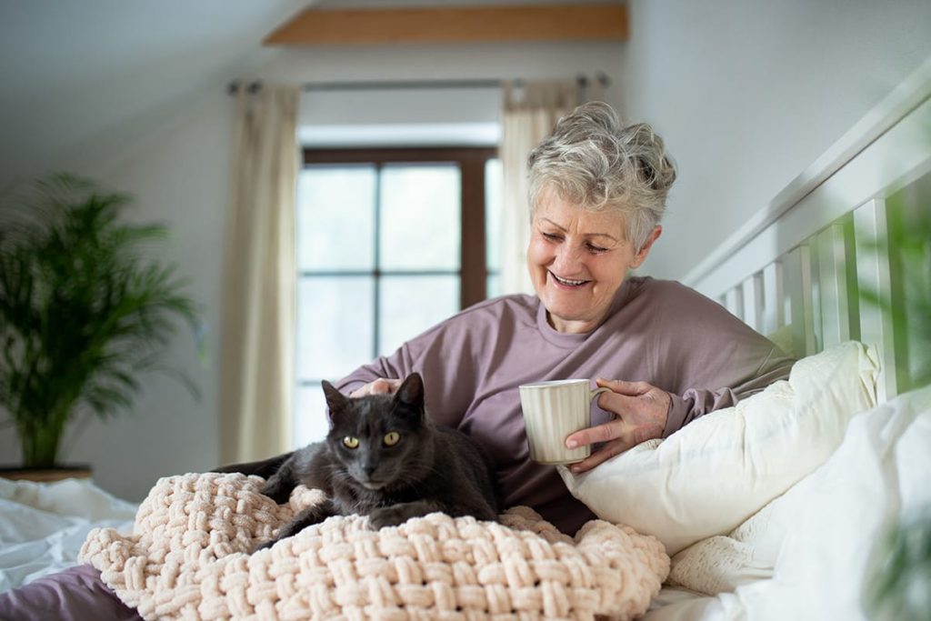 Older adult working on recovery after surgery