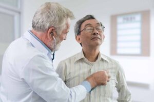 Doctor and patient checking for heart disease in older adults