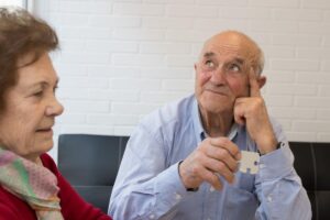 Two people talking about the typical coping strategies for dementia