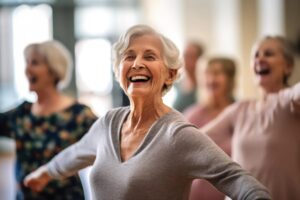 Happy woman in group fitness class prioritizing staying active as a senior