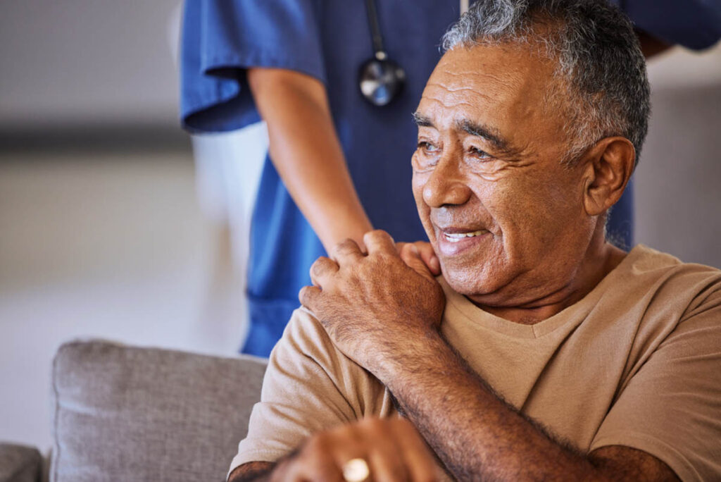 caretaker helping senior transition to independent living